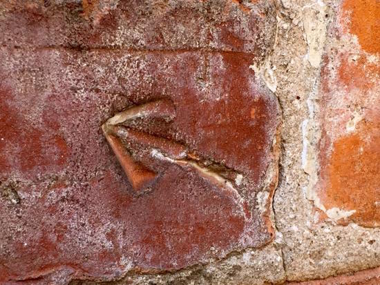 arrow on brick penitentiary